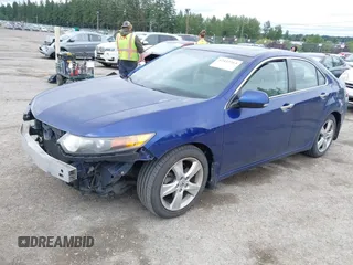 2009 Acura TSX z VIN JH4CU26659C035023, wystawiony jako IAAI lot #42433763 z przebiegiem 145 356 mil mil oraz . Historia ofert i sprzedaży dostępna na DreamBid. Obrazek 2.