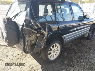 2000 Toyota RAV4 with VIN JT3GP10V5Y7073965, listed as a IAAI auction lot 42013237 with 284,594 mi miles and . Bid and sale history available at DreamBid. Image 4.