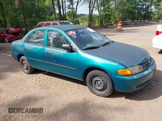 1997 Mazda Protege DX z VIN JM1BC1418V0112707, wystawiony jako IAAI lot #42202679 z przebiegiem Nie podano mil oraz . Historia ofert i sprzedaży dostępna na DreamBid. Obrazek 1.