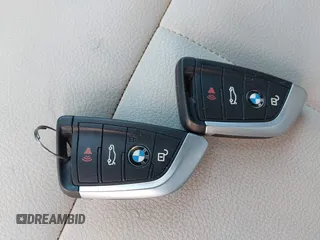 2021 BMW X1 xDrive28i with VIN WBXJG9C02M3M42379, listed as a IAAI auction lot 42476221 with 60,412 mi miles and . Bid and sale history available at DreamBid. Image 11.