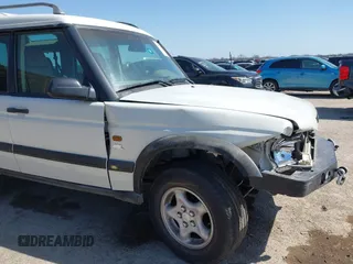 2000 Land Rover Discovery Cloth z VIN SALTY124XYA262828, wystawiony jako IAAI lot #41769729 z przebiegiem 215 711 mil mil oraz . Historia ofert i sprzedaży dostępna na DreamBid. Obrazek 6.