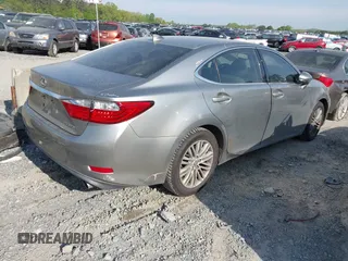 2015 Lexus ES 330 with VIN JTHBK1GG4F2210821, listed as a IAAI auction lot 41999107 with 140,551 mi miles and . Bid and sale history available at DreamBid. Image 4.