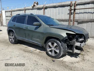 2019 Jeep Cherokee Limited with VIN 1C4PJLDB5KD357078, listed as a Copart auction lot 52715155 with 107,912 mi miles and Salvage title. Bid and sale history available at DreamBid. Image 4.