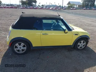 2005 MINI Convertible with VIN WMWRF33435TG11068, listed as a IAAI auction lot 42346035 with 147,367 mi miles and . Bid and sale history available at DreamBid. Image 13.