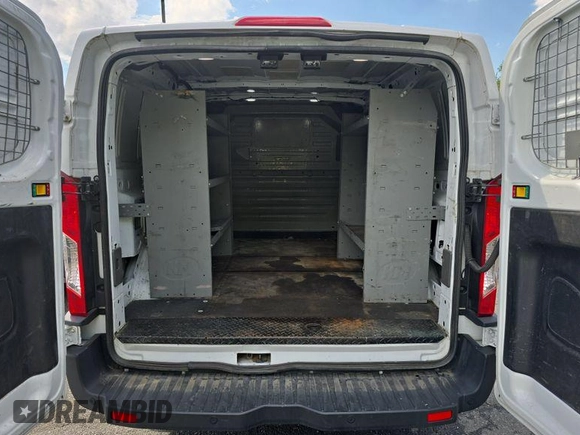 2021 Ford Transit Cargo with VIN 1FTBR2YG3MKA85227, listed as a IAAI auction lot 42678741 with 122,360 mi miles and . Bid and sale history available at DreamBid. Image 22.