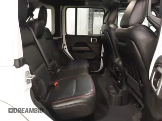 2022 Jeep Wrangler Unlimited Rubicon z VIN 1C4HJXFG7NW106446, wystawiony jako IAAI lot #41405202 z przebiegiem 39 755 mil mil oraz . Historia ofert i sprzedaży dostępna na DreamBid. Obrazek 8.