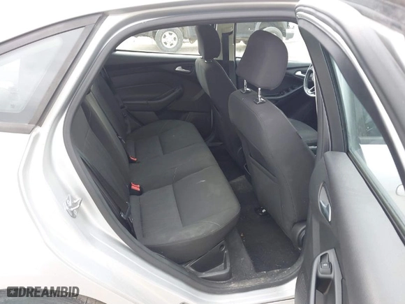 2015 Ford Focus SE with VIN 1FADP3F24FL297665, listed as a IAAI auction lot 41893672 with 105,719 mi miles. Bid and sale history available at carsss.com. Image 8.