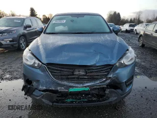 2016 Mazda CX-5 Sport with VIN JM3KE4BY3G0876082, listed as a Copart auction lot 86438024 with 203,544 mi miles and Salvage Title. Bid and sale history available at carsss.com. Image 5.