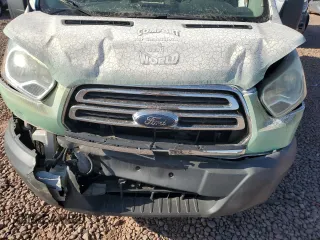 2016 Ford Transit Cargo with VIN 1FTYR1ZMXGKA59298, listed as a Copart auction lot 49418815 with 116,982 mi miles and Salvage Title. Bid and sale history available at carsss.com. Image 12.