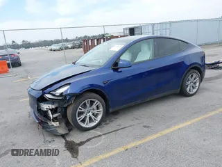 2023 Tesla Model Y Long Range with VIN 7SAYGDEE7PA194998, listed as a IAAI auction lot 41787170 with 16,221 mi miles and . Bid and sale history available at DreamBid. Image 17.