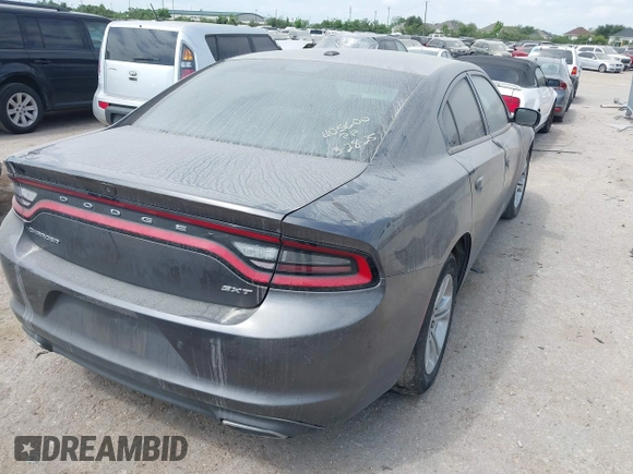 2018 Dodge Charger SXT with VIN 2C3CDXBGXJH180271, listed as a IAAI auction lot 42071701 with 129,325 mi miles and . Bid and sale history available at DreamBid. Image 4.