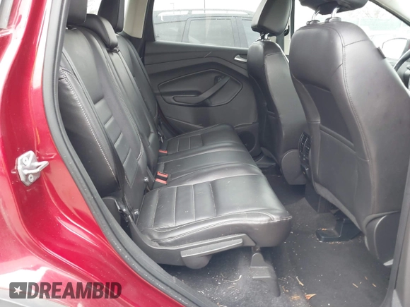 2016 Ford Escape Titanium with VIN 1FMCU9J92GUB13000, listed as a IAAI auction lot 41725258 with 66,817 mi miles. Bid and sale history available at carsss.com. Image 8.