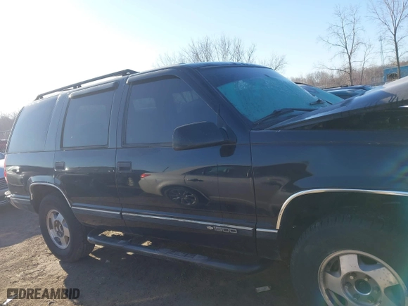 1996 Chevrolet Tahoe with VIN 1GNEK13RXTJ418622, listed as a IAAI auction lot 41879760 with 349,211 mi miles. Bid and sale history available at carsss.com. Image 13.