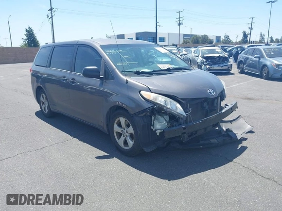 2012 Toyota Sienna with VIN 5TDZK3DC9CS261944, listed as a IAAI auction lot 41885359 with 184,918 mi miles. Bid and sale history available at carsss.com. Image 1.