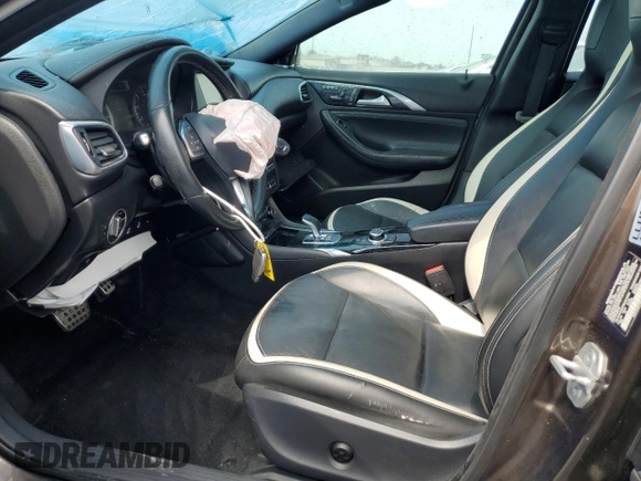 2017 Infiniti QX30 Sport with VIN SJKCH5CP8HA014663, listed as a Copart auction lot 55026195 with 103,514 mi miles and Salvage title. Bid and sale history available at DreamBid. Image 7.