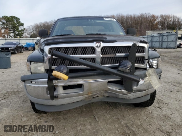 2000 Dodge 1500 z VIN 1B7HF13Z7YJ115816, wystawiony jako Copart lot #84693474 z przebiegiem 189 647 mil mil oraz Szkoda całkowita • Salvage title. Historia ofert i sprzedaży dostępna na DreamBid. Obrazek 5.