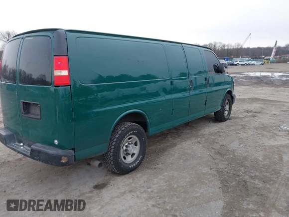 2014 Chevrolet Express Cargo Van with VIN 1GCWGGCAXE1198199, listed as a IAAI auction lot 41242821 with 274,446 mi miles. Bid and sale history available at carsss.com. Image 4.