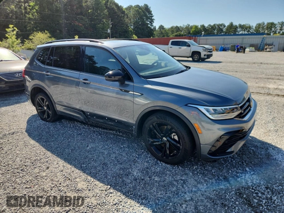 2023 Volkswagen Tiguan SE R-Line Black with VIN 3VVCB7AX3PM056471, listed as a Copart auction lot 60679225 with 94,752 mi miles and Clean title. Bid and sale history available at DreamBid. Image 4.