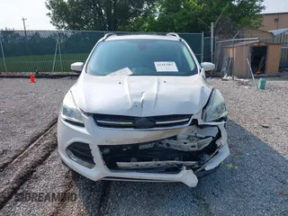 2015 Ford Escape Titanium with VIN 1FMCU0JXXFUA07175, listed as a IAAI auction lot 42447067 with 94,893 mi miles and . Bid and sale history available at DreamBid. Image 12.