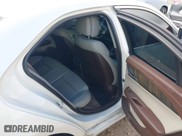 2013 Cadillac ATS Performance z VIN 1G6AC5S36D0111225, wystawiony jako IAAI lot #41511694 z przebiegiem 153 250 mil mil oraz . Historia ofert i sprzedaży dostępna na DreamBid. Obrazek 8.