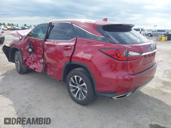 2022 Lexus RX 350 with VIN 2T2HZMAA0NC256932, listed as a IAAI auction lot 42179918 with 24,790 mi miles and . Bid and sale history available at DreamBid. Image 3.