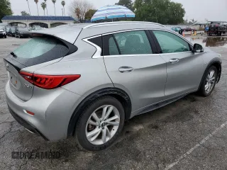 2019 Infiniti QX30 Luxe with VIN SJKCH5CP4KA011380, listed as a Copart auction lot 48665745 with 86,749 mi miles and Salvage title. Bid and sale history available at DreamBid. Image 3.