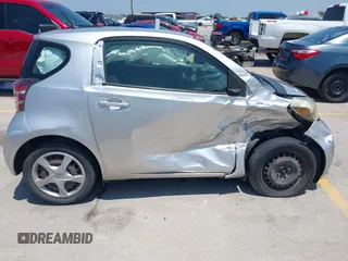 2012 Scion iQ with VIN JTNJJXB07CJ018562, listed as a IAAI auction lot 42404672 with 79,867 mi miles and . Bid and sale history available at DreamBid. Image 14.