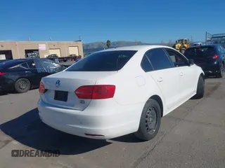 2012 Volkswagen Jetta Sedan S w/Sunroof with VIN 3VW2K7AJXCM355596, listed as a IAAI auction lot 41642491 with 130,937 mi miles. Bid and sale history available at carsss.com. Image 4.