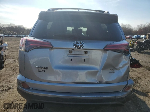 2018 Toyota RAV4 LE with VIN JTMBFREVXJJ220838, listed as a Copart auction lot 52870975 with 125,456 mi miles and Salvage Title. Bid and sale history available at carsss.com. Image 6.