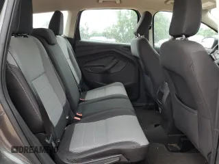 2019 Ford Escape S z VIN 1FMCU0F75KUA87696, wystawiony jako Copart lot #56312775 z przebiegiem 84 472 mil mil oraz Szkoda całkowita • Salvage title. Historia ofert i sprzedaży dostępna na DreamBid. Obrazek 11.