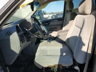 2009 GMC Envoy SLE with VIN 1GKDS33SX92131159, listed as a Copart auction lot 82487404 with 224,391 mi miles and Salvage Title. Bid and sale history available at carsss.com. Image 7.