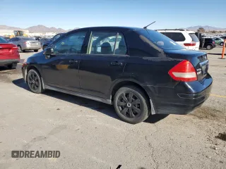 2010 Nissan Versa 1.8 S with VIN 3N1BC1AP2AL376000, listed as a Copart auction lot 41435585 with 215,017 mi miles and Salvage Title. Bid and sale history available at carsss.com. Image 2.