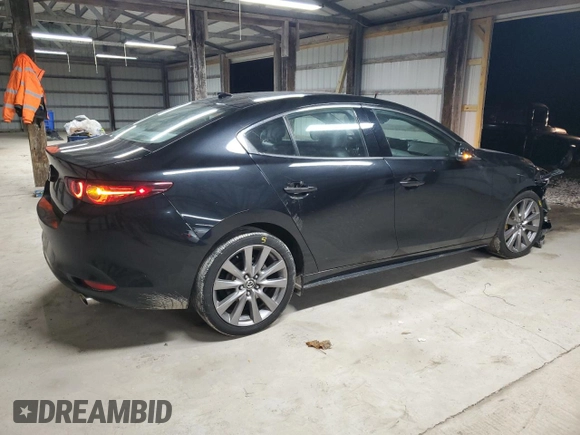 2019 Mazda 3 Premium with VIN 3MZBPAEM7KM102348, listed as a Copart auction lot 84587534 with 73,125 mi miles and Salvage Title. Bid and sale history available at DreamBid. Image 3.