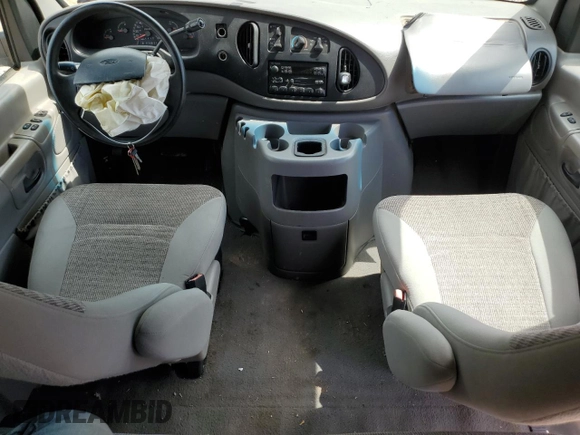 2000 Ford Econoline Passenger XL with VIN 1FBSS31L5YHA98957, listed as a Copart auction lot 56466624 with 102,350 mi miles and Salvage Title. Bid and sale history available at DreamBid. Image 8.