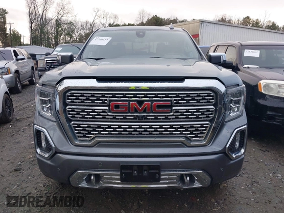 2020 GMC Sierra 1500 Denali z VIN 3GTU9FED1LG164752, wystawiony jako IAAI lot #41530535 z przebiegiem 119 037 mil mil oraz . Historia ofert i sprzedaży dostępna na DreamBid. Obrazek 12.