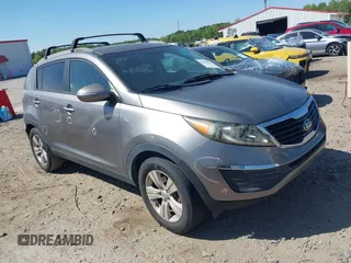 2013 Kia Sportage LX with VIN KNDPB3A21D7486860, listed as a IAAI auction lot 42049450 with 177,059 mi miles and . Bid and sale history available at carsss.com. Image 1.