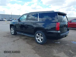 2015 Chevrolet Tahoe LT with VIN 1GNSCBKCXFR214072, listed as a IAAI auction lot 40512435 with 98,955 mi miles and . Bid and sale history available at DreamBid. Image 3.