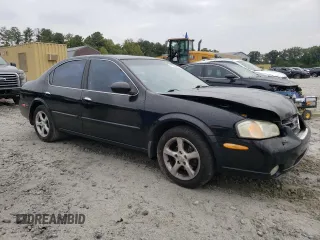 2000 Nissan Maxima GXE z VIN JN1CA31A8YT210913, wystawiony jako Copart lot #56272455 z przebiegiem 281 645 mil mil oraz Nie do naprawy • Non repairable. Historia ofert i sprzedaży dostępna na DreamBid. Obrazek 4.