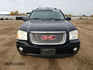 2007 GMC Envoy SLT with VIN 1GKDT13S972197393, listed as a Copart auction lot 77958764 with 151,586 mi miles and Salvage Title. Bid and sale history available at DreamBid. Image 5.