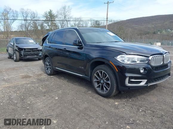 2017 BMW X5 xDrive35i with VIN 5UXKR0C31H0V78672, listed as a IAAI auction lot 42084958 with 95,782 mi miles and . Bid and sale history available at DreamBid. Image 1.
