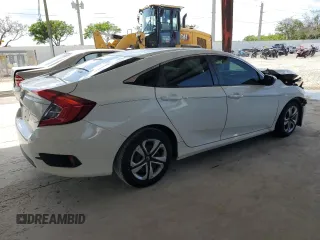2017 Honda Civic LX z VIN 19XFC2F57HE044404, wystawiony jako Copart lot #58196105 z przebiegiem 117 664 mil mil oraz Szkoda całkowita • Salvage title. Historia ofert i sprzedaży dostępna na DreamBid. Obrazek 3.