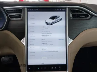 2014 Tesla Model S 60 with VIN 5YJSA1S16EFP53350, listed as a IAAI auction lot 42239753 with 104,985 mi miles and . Bid and sale history available at DreamBid. Image 18.