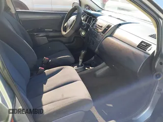 2009 Nissan Versa 1.8 S with VIN 3N1BC11E09L377706, listed as a IAAI auction lot 42027981 with 146,105 mi miles. Bid and sale history available at carsss.com. Image 5.
