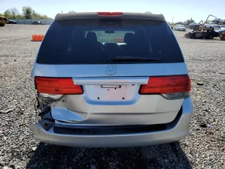 2010 Honda Odyssey EX-L with VIN 5FNRL3H76AB114542, listed as a Copart auction lot 54785425 with 104,239 mi miles and Salvage Title. Bid and sale history available at DreamBid. Image 6.