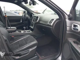 2015 Jeep Grand Cherokee Altitude with VIN 1C4RJEAG3FC219782, listed as a IAAI auction lot 42076212 with 194,910 mi miles. Bid and sale history available at carsss.com. Image 5.