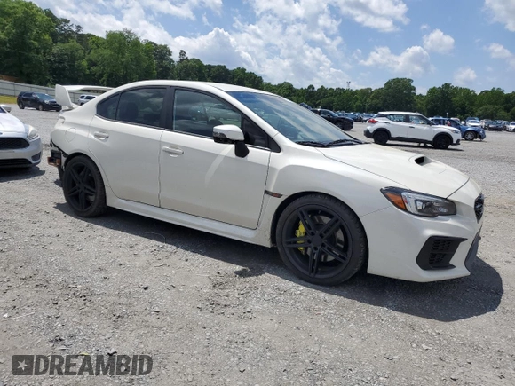 2021 Subaru WRX STI with VIN JF1VA2E60M9814538, listed as a Copart auction lot 56328295 with 58,512 mi miles and Salvage title. Bid and sale history available at DreamBid. Image 4.