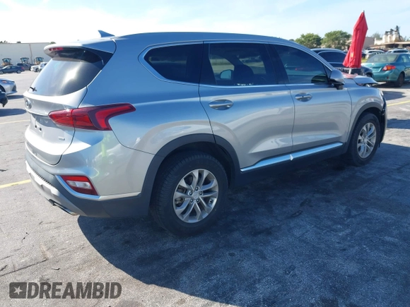 2020 Hyundai Santa Fe SEL with VIN 5NMS3CAD5LH218667, listed as a IAAI auction lot 41025347 with 81,632 mi miles and . Bid and sale history available at DreamBid. Image 4.