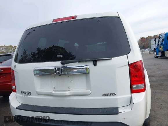 2015 Honda Pilot EX-L with VIN 5FNYF4H51FB010541, listed as a IAAI auction lot 40893246 with 215,295 mi miles and . Bid and sale history available at carsss.com. Image 16.