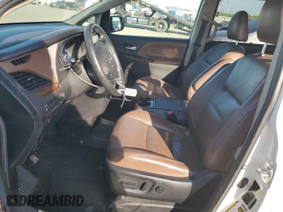 2015 Toyota Sienna Limited with VIN 5TDDK3DC2FS099332, listed as a Copart auction lot 47571435 with 107,449 mi miles and Salvage Title. Bid and sale history available at DreamBid. Image 7.