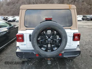 2021 Jeep Wrangler Unlimited Sahara с VIN 1C4JJXP62MW677073, выставлен на аукционе Copart как лот 61348075 с пробегом Не указан миль и Списание • Salvage title. История ставок и продаж доступна на DreamBid. Изображение 6.